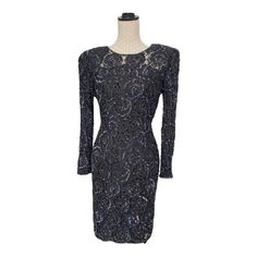 Black Beaded Lace Dress Vintage 1980s sequin embroidered lace dress gown Shoulder pads are  easily removalable Leslie Fay 90s / 80s 100% Rayon 100% Polyester lining This stunning black beaded dress by Leslie Fay Evenings is perfect for any formal occasion. With intricate embroidery and regular sleeve type, this knee-length dress features a round neckline and a zip closure. The dress is made from a blend of polyester and rayon fabric, which gives it a vintage look. Ideal for weddings, parties, an Beaded Lace Dress, Black Beaded Dress, Embroidered Lace Dress, Lace Dress Vintage, 80s Dress, 90s Dress, 90s 80s, Intricate Embroidery, Dress Gown