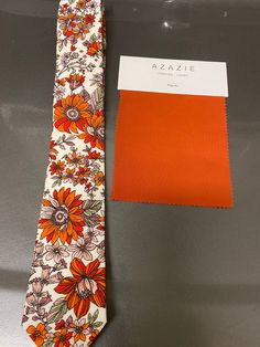 Details:  Material: 100% Cotton  Colour: Orange Floral *Package: tie * Dimensions of Pocket Square- --Length -28 cm --Width -28 cm * Dimensions of 6.5cm skinny tie --Approx. 145cm in the length; 6.5cm in the width * Dimensions of 8.5cm Necktie --Approx. 145cm in the length; 8.5cm in the width *Bow tie Size: Approx. 12CM length of bow tie;Height of bow tie 7cm *Kids Bow tie:* Dimensions of kids Bow tie- --Approx. 9CM length of bow tie;Height of bow tie 5cm; strap width 1.8cm S H I P PING: Product Mens Handkerchief Ideas, Earthy Man, Orange Pocket Square, Mens Neckties, Fall Ties, Floral Ties, Wedding Tux, Floral Necktie, Kids Bow Ties