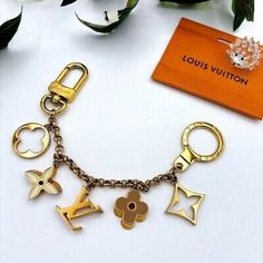 LOUIS VUITTON M65111 Key Ring Holder Bag Charm Chain Fleur de Monogram LV Logo   | eBay Lv Logo, Key Ring Holder, Charm Chain, Lv Monogram, Buy 1, Ring Holder, Key Ring, Key Rings, Women's Accessories