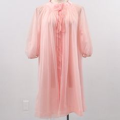 Elegant Vtg Airy Short Nightgown Robe. Soft Flowing Pink Fabric & Multiple Layers, Gathered 3/4 Long Sleeves. Bow & Snap Closure At Top. Vintage Fair Condition - Small Picks & 2 Small Holes That Get Lost In The Layers P6-9. Beautiful & Unique. Cotton Candy Halloween Costume? As-Is 1 Only. Tagless. Model 4. Fits Os. Buy M! Flat~ 17 Sl 35 L Relax Everyday Quarantine Leisure Romantic Sexy Lingerie Intimates Girly Luxury Gathered Ruffle Soft Vintage Hostess 60s Airy Sheer Peignoir Angelic Retro Pink Sleepwear For Spring, Vintage Pink Sleepwear, Vintage Sheer Pink Nightgown, Vintage Pink Sheer Nightgown, Pink Sheer Vintage Nightgown, Vintage Sheer Sleepwear, Vintage Pink Nightgown For Spring, Vintage Pink Sleepwear For Wedding Night, Pink Sheer Coquette Dress