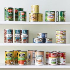 an assortment of canned food items on shelves