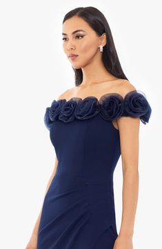 Voluminous organza rose appliqués blossom along the off-the-shoulder neckline of a sweeping scuba-crepe gown softly ruched at the left hip. 54 1/2" center front length; 60" back length (size 8) Hidden back-zip closure Off-the-shoulder neck Cap sleeves Lined 94% polyester, 6% spandex with 100% polyester contrast Spot clean Imported Off The Shoulder Dress Pattern, Mog Dresses, Off Shoulder Gown, Crepe Gown, Dress Alterations, Fashion Designing, Scuba Dress, Amazon Gadgets, Prom Dresses Ball Gown