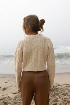 The softest cardigan you will ever wear! This sweater is slightly cropped with beautiful cable knit detailing and front buttons. Long sleeve Knit Cropped Acrylic, Poly, Span Cream Cable Knit Sweater, Soft Cardigan, Fall Day, Ceramic Gifts, Candle Collection, Cable Knit Sweater, Swim Accessories, Cropped Cardigan, Gold Filled Jewelry