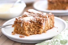 a close up of a piece of cake on a plate with a fork in it