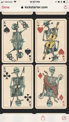 the skeleton playing cards have four different designs on each card, and one is holding a guitar