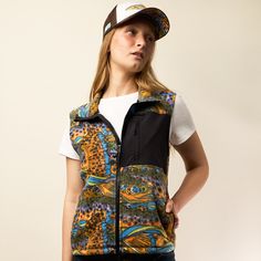 Crafted with a nostalgic touch this vest features a soft and warm fleece fabric that keeps you cozy and stylish in cooler weather. With its timeless design, versatile zip-up front, and convenient pockets, it's the perfect layering piece to add a touch of retro charm to any outfit. Full Zip Vest Woven patch pocket with secure zipper Fleece lined stand collar Fleece Vest Women, Hiking Jacket, Fleece Vest, Cooler Weather, Womens Fleece, Short Socks, Cycling Outfit, Layering Pieces, Fleece Fabric