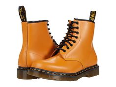 Dr. Martens 1460 Smooth Leather Boot - Lace-up Boots : Pumpkin Orange Smooth : This well-constructed 1460 Smooth Leather Boot by Dr. Martens offers a clean and colorful look to your modern style. Made from the finest quality leather, pre-inspected for scars before construction. Part of the Core Collection. It may look like just another product number, but to anyone who's ever rocked a pair of Docs, the 1460 boots were the only kicks you ever wore. Leather upper with smooth finish. Harvey Leather Orange Doc Martens, Hollow Aesthetic, Orange Boots, Pixie Hollow, Kawaii Shoes, Shoe Boutique, Leather Boot, Pumpkin Orange, Doc Martens