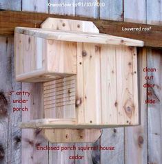 a wooden bird house with instructions on how to make it hanging from the side of a fence