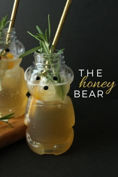 the honey bear cocktail is garnished with rosemary