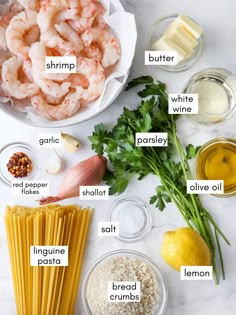 ingredients to make shrimp pasta laid out on a white counter top with text overlay