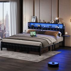 a bedroom with a bed, nightstands and large windows overlooking the cityscape