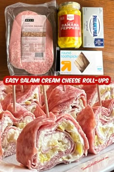 ham and cheese roll ups on a white plate next to cans of mustard, mayonnaise, salt and pepper