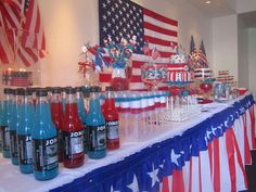 an american flag themed party with soda bottles