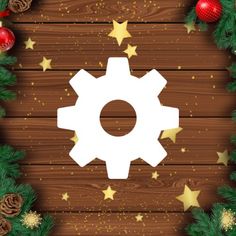 a wooden background with christmas decorations and stars