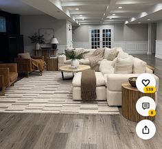 a living room filled with lots of furniture on top of a hard wood floored floor