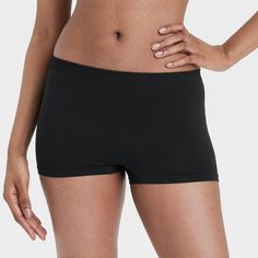 Move through your busy day in cool comfort in these Seamless Boy Shorts from Colsie™. Made from lightweight fabric, these regular-rise boy shorts allow you to move freely all day, and they're designed in a seamless silhouette for a smooth and sleek look. Designed in a solid hue, these boy shorts are a great choice for wearing under a variety of outfits. Colsie™: All You, Inside and Out. Sporty Seamless Short Leg Boxer Briefs, Solid Seamless Biker Shorts With Short Inseam, Seamless Biker Shorts With Short Inseam, Seamless 4-way Stretch Mid-thigh Shorts, Seamless Sports Boxer Briefs, Stretch Seamless Short Boxer Briefs, Stretch Short Boxer Briefs With Seamless Construction, Stretch Seamless Boxer Briefs, Sporty Seamless Bottoms With Short Inseam