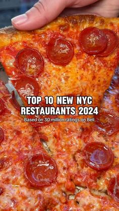 a hand holding a slice of pizza with pepperoni on it and the words top 10 new york restaurants, 2012