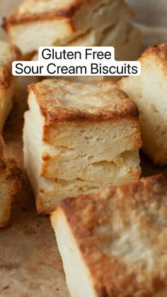 gluten free sour cream biscuits stacked up on top of each other