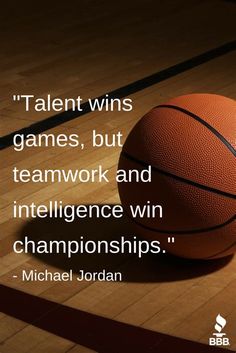 a basketball sitting on top of a wooden floor next to a quote from michael jordan