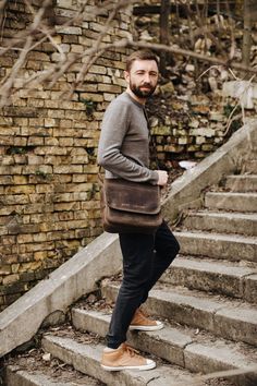 If you think it is time to ditch your old, tired-looking messenger bag, then check out our newest addition to the ever-popular shoulder carryall. No polyester material or plastic buckle in sight, this handcrafted messenger bag shows off high quality saddle leather and antique-coloured hardware. Long-term use will produce a deeper tone in the leather, adding character to it and enhancing the bag's overall appearance. Based on the traditional school satchel design, the bag has a large flap closure Casual Leather Satchel Flap Bag, Casual Leather Flap Shoulder Bag, Casual Leather Shoulder Flap Bag, Casual Brown Leather Flap Bag, Rugged Travel Crossbody Bag, Outdoor Leather Shoulder Saddle Bag, Rugged Rectangular Shoulder Bag With Leather Lining, Classic Crossbody Shoulder Bag For Outdoor, Rugged Brown Bag With Adjustable Strap