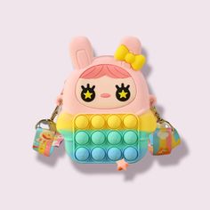 This beautiful pop-it fidget princess croosbody bag is made with beautiful colors to attract the children attention. The pop it is very light, to make a pop sound making fun for children to relieve anxiety and stress. It is perfect for children wirh ADHD and ADD .This lttle bag is designed with adjustable shoulder straps to make it easy and comfortable to carry. ATTENTION: Children should play under the supervision of an adult. Product Details: Material: Silicon bubble. Eco friendly material. St Colors For Children, It Bag, Pop It, Coloring For Kids, Cool Things To Make, Shoulder Straps, Beautiful Colors, Bubbles, Sound