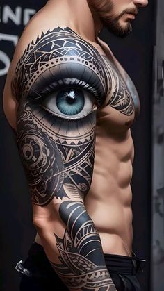 a man with an eye tattoo on his arm and chest is looking at the camera