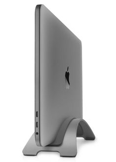 an apple computer sitting on top of a stand