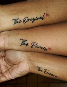 two people with matching tattoos on their arms holding each other's hands and the words the original, the remain