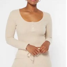 Treat Yourself To All-Day Cozy In This Softer-Than-Cashmere Hacci Knit Henley Featuring A Scoop, Snap Neckline And Skimmer Length Fit. Crop Length 20" Length (Size Small) 96% Polyester, 4% Spandex Machine Wash Imported Model Is Wearing Size Small Ribbed Neutral Top For Fall, Neutral Soft Knit Tops For Loungewear, Cozy Fitted Top For Day Out, Cozy Fitted Tops For Day Out, Beige Knit Top For Fall Loungewear, Cozy Beige Knit Top For Loungewear, Neutral Tops For Loungewear In Fall, Neutral Tops For Fall Loungewear, Cozy Beige Tops For Day Out