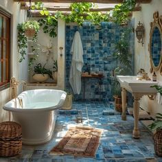 a bath room with a tub a sink and a mirror on the wall in it