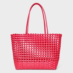 From beach hangs to weekend brunches, elevate your sunny weather look with this Woven Cage Tote Handbag from Shade & Shore™. This structured tote handbag features a single compartment for stashing essentials like towels, hats, sunscreen and more, while the open-top design allows for easy access. Designed in a solid hue with an open-weave design, it sports double tote handles for easy carrying. Shade & Shore™: Found exclusively at Target. Modern Bucket Bag For The Beach, Casual Summer Shoulder Bag With Reinforced Handles, Summer Beach Bag With Reinforced Handles For Everyday Use, Summer Tote Shoulder Bag With Reinforced Handles, Versatile Pink Summer Bag, Versatile Pink Summer Bags, Modern Beach Bucket Bag, Summer Beach Bag With Reinforced Handles For Shopping, Modern Bucket Bag For Beach