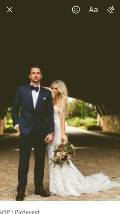 a man and woman standing next to each other