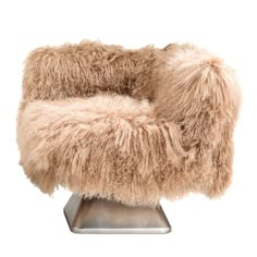 a furry chair sitting on top of a metal base