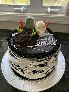 a halloween themed cake on a white plate