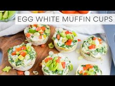 egg white muffin cups on a cutting board with carrots and celery