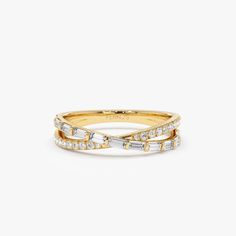 "Statement RIng / 14k Mix Baguette and Round Diamond Crossover Ring / Criss-Cross Diamond Stacking Ring / Minimalist Ring Ferko's Fine Jewelry Gold Kt: 14K (also available in 18K) Available Gold Color: Rose Gold, Yellow Gold, White Gold Round Diamond: 20 pcs 1.2 MM Baguette Diamond: 11 pcs 3x1.4 MM Number of Stones: 31 Total CTW: 0.49 Ctw Baguette Diamond Color-Clarity: G Color VS Round Diamond Color-Clarity - G Colors SI Clarity If you have any additional questions about this ring, just hit the Crossover Wedding Band, Yellow Gold Baguette Ring With Diamond Cut, Yellow Gold Baguette Rings With Single Cut Diamonds, Baguette Yellow Gold Diamond Ring Fine Jewelry, Baguette Yellow Gold Diamond Ring, Baguette Single Cut Diamond Rings, Yellow Gold Baguette Ring Fine Jewelry, Fine Jewelry Baguette Rings With Half Eternity, Fine Jewelry Yellow Gold Baguette Ring