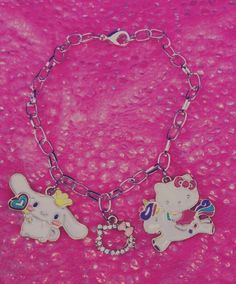 These adorable bracelets are sure to make you smile each time you put them on or make someone's day as a gift.  Handmade and one of a kind, from Canada.  Kawaii charm characters on a chain metal bracelet, with a lobster claw clasp, adjustable size. Playful White Jewelry With Charms, Friendship Themed Charm Bracelet, Cute Charm Bracelet With Dangling Charms As Gift, Pink Harajuku Style Jewelry Gift, Cute Jewelry With Dangling Charms For Birthday, Cute Friendship Dangling Charms, Cute Birthday Jewelry With Dangling Charms, Friendship Novelty Charm Bracelet, Kawaii Dangle Earrings For Birthday