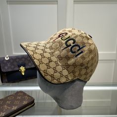 SHOP MORE LUXURY PRODUCTS HERE Description Gucci Canvas Baseball Hat Beige GG Hat Instantly recognizable emblems of the brand, logos enrich designs in new and unexpected ways. Behind every logo lies the tradition and value of the House, an everlasting medium one can wear again and again. BeigeBeige GG canvasLogo GucciAdjustable hook-and-loop closure on back Includes box, dust bag.This product is of the premium quality. Classic Hat With Logo Print And Curved Brim, Classic Curved Brim Hat With Logo Print, Classic Hat With Curved Brim And Logo Print, Classic Logo Cap, Luxury Beige Hat With Embroidered Logo, Luxury Baseball Cap With Logo And Curved Brim, Designer Brown Baseball Cap, Adjustable Logo Print Visor Hat, Luxury Hats With Logo Patch And Curved Brim