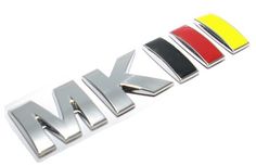 the word think written in chrome letters with red, yellow, and black letters on it