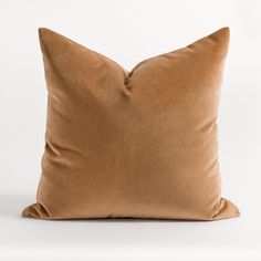 Valentina Velvet Nutmeg Pillow, a camel coloured velvet pillow from Tonic Living Warm Minimalist Home Pillows, Camel Colored Pillow, Dark Taupe Pillows, Warm Neutral Living Room Pillows, Pillows Natural Color, Tan Cou H With Pillows, Bed Pillow Brown, Neutral Velvet Pillows 22x22, Camel Color Pillow Covers 26x26