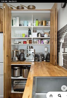 the kitchen is clean and ready to be used as a storage area for cooking utensils