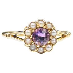 This pretty antique Amethyst and seed pearl cluster ring is delicately charming and oh so sweet. We love it's soft floral design and vibrant lush amethyst, set to the centre and surrounded by a halo of creamy seed pearls. The ring is crafted in rich 18kt yellow gold and it has a smooth slender band with bifurcated shoulders. She is a real beauty, perfect for stacking with bands, this ring would make a wonderful gift or a nice addition to your antique jewellery collection. Marks and era: Fully ha Vintage Cluster Ring, Pearl Cluster Ring, Amethyst Set, Gold For Sale, Pearl Cluster, Sterling Jewelry, Soft Floral, Seed Pearl, Real Beauty