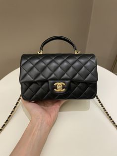 Chanel Quilted Top Handle Mini RectangularBlack Lambskin LGHWSize 20 x 12.5 x 6.5 cmChain drop 53 cmMicro ChipNov 20218/10 Good (some corners side edges rub, base and under flap scratches otherwise great. Well structured)Includes full set box, dust bag and receiptPrice now 4900 sgd 3680 usd CN6041-01 Mini Chanel, Designer Bags Louis Vuitton, Chanel Top, Side Edges, Quilted Top, Gold Ounce, Flap Bag, Full Set, Chanel Bag