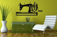 a wall decal with a sewing machine on it