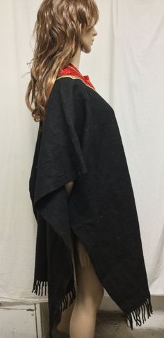 "Poncho top,Indian Poncho,Ethnic Large,Poncho ,Black ,Red Velvet collar, Fringed Measurements\" Width 35\" Length 38\" Fringe 2 1/2\" Good condition J 477 Poncho top,Indian Poncho,Ethnic Large,Poncho ,Black ,Red Velvet collar, Fringed" Black One Size Poncho For Beach, Black Beach Poncho One Size, Black One Size Beach Poncho, Oversized Black Bohemian Top, Black Long Sleeve Poncho For Beach, Black Long Sleeve Beach Poncho, Black Bohemian Poncho One Size, Black Cape For Fall Festivals, Black Fall Festival Cape