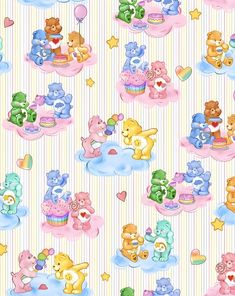 a group of teddy bears sitting on top of a bed next to a cupcake