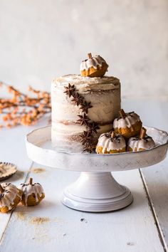 a white cake with frosting and decorations on top