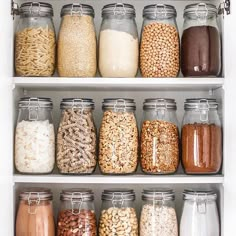 an organized pantry filled with lots of different types of cereals and grains in glass jars