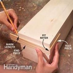 a person is working on a piece of wood with a pencil in their left hand