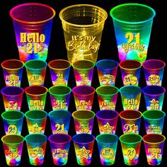 many different colored plastic cups with numbers on them